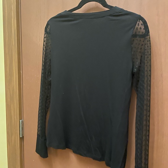 Black pullover blouse with polka dotted shoulder and arms. Size 42 or Medium - Picture 10 of 10